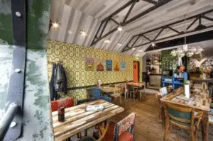 Kandinsky x Shoe Quarter fall vacation action, inside interior of restaurant